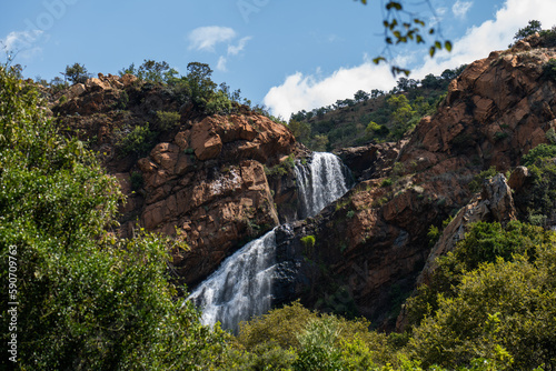 Beautiful Waterfall at the Krugersdorp Botanical gardens. Beautiful nature with stunning water patterns and greenery showing the lush beauty as the water cascades
