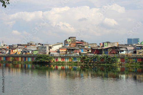 Densely populated houses on the edge of Lake Sunter or danau sunter. photo