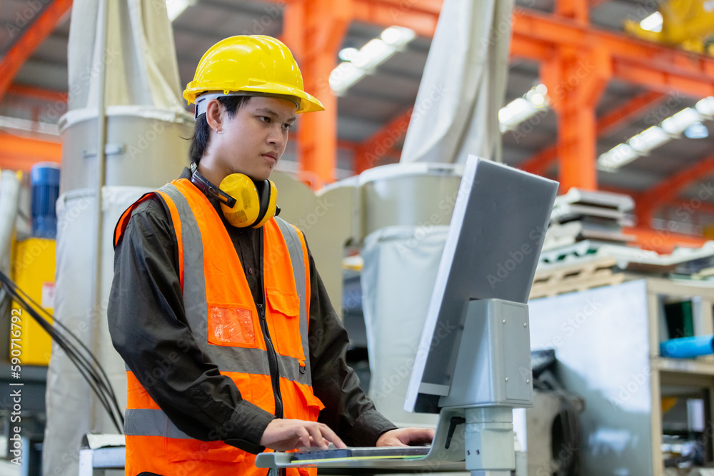 Man engineer technical working in power plant control panel of industry