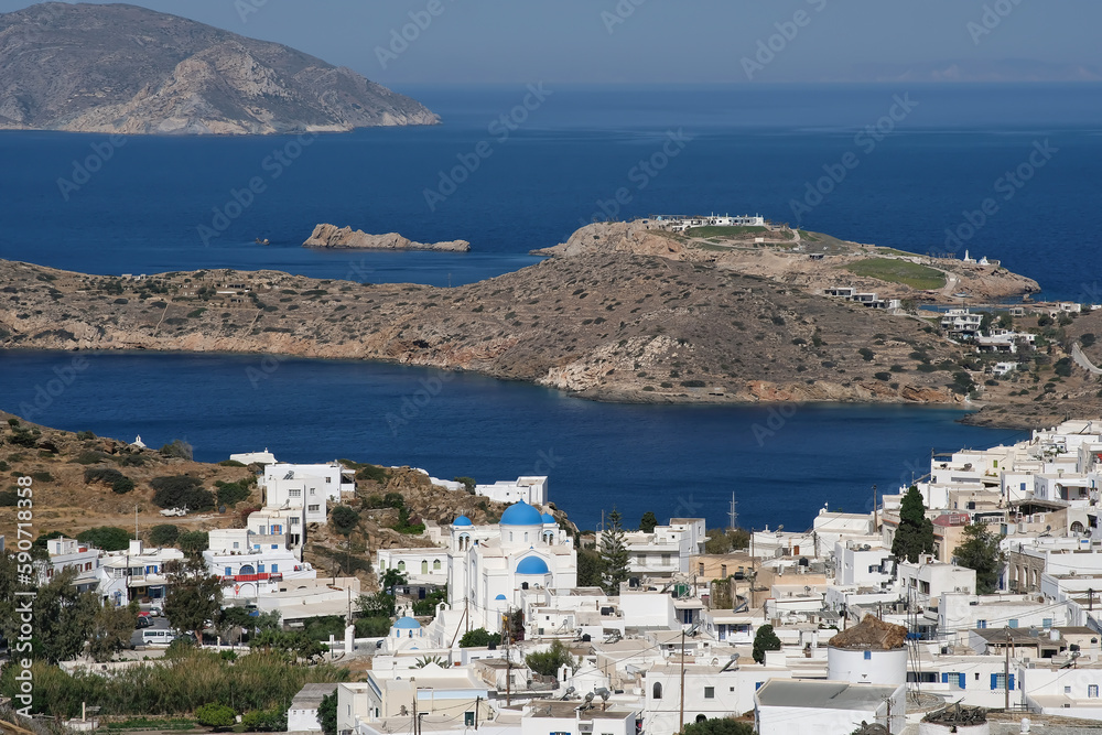 Panoramic view of the whitewashed village and the port of Ios Greece