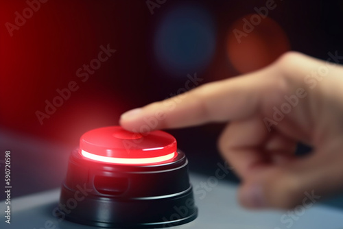 Pushing the Button: Close-up of Finger on Game Show Buzzer photo