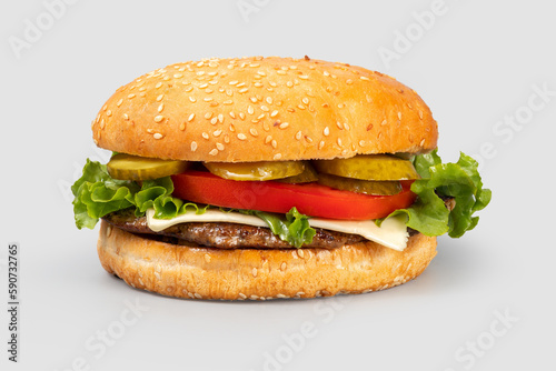 Wallpaper Mural Cheeseburger with pickled cucumbers close-up on a light gray background Torontodigital.ca