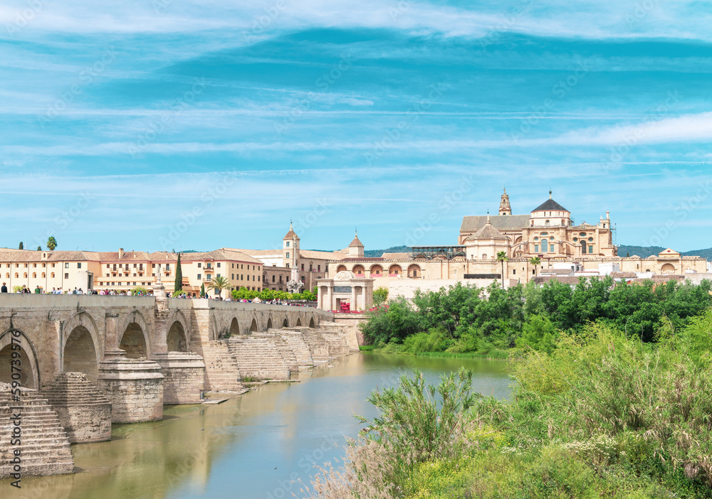 Cordoba city landscape with ancient bridge in Spain