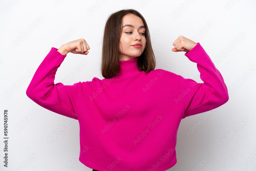 Young Ukrainian woman isolated on white background doing strong gesture Young Ukrainian woman isolated on white background doing strong gesture