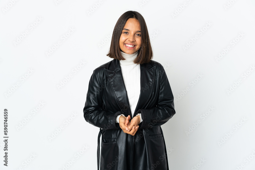 Young latin woman isolated on white background laughing