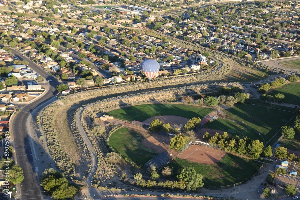 Fototapeta premium USA-themed hot air balloon over a little league baseball park in Albuquerque City, New Mexico