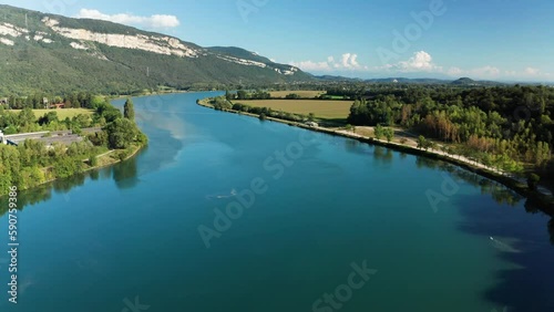 Massive riverbed surrounded by green forests and mesmerizing view of mountains, 4k, aerial photo