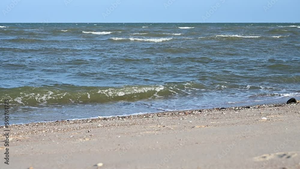 slow motion water wave on sea and sand lanscape with blue sky, beautiful natural background slow motion water wave on sea and sand lanscape with blue sky, beautiful natural background