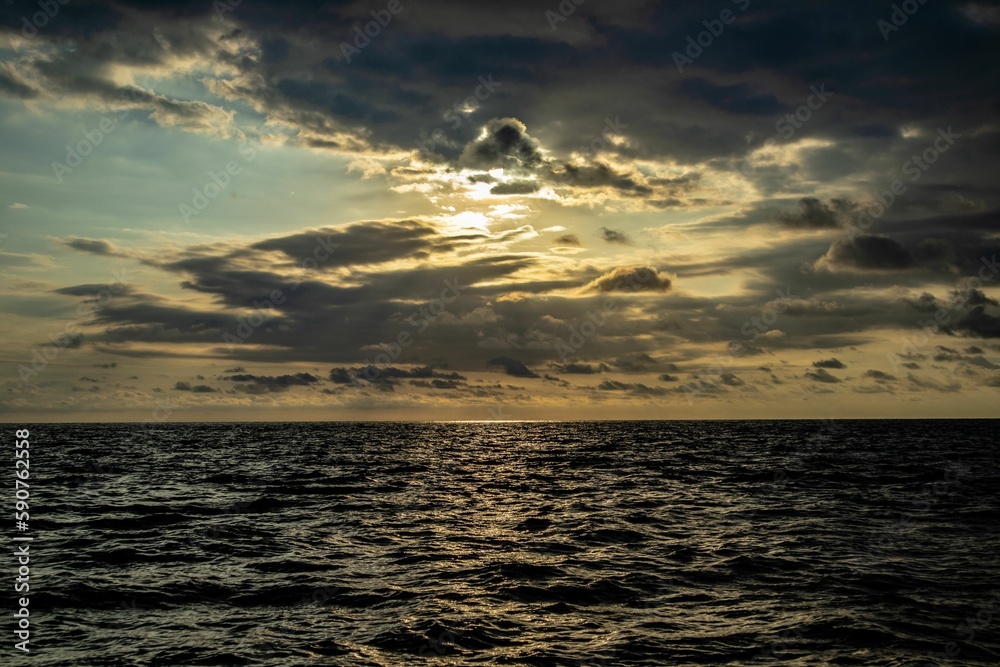Beautiful wavy sea under a cloudy, but sunny sky Beautiful wavy sea under a cloudy, but sunny sky