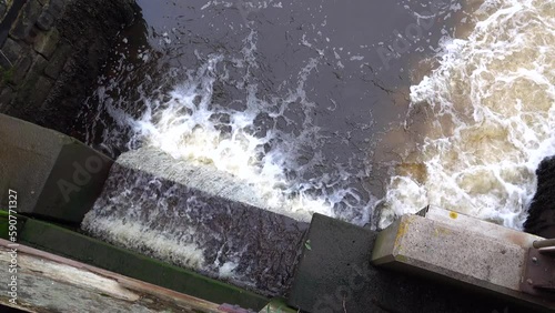 Water pouring from a river sluice gate