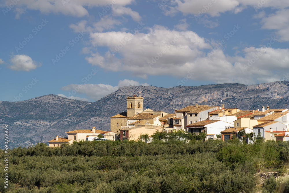 Small town with mountains on the background. In Catamarruch, Alicante (Spain).