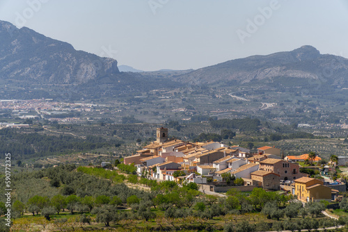 Small town with mountains on the background. In Catamarruch, Alicante (Spain).