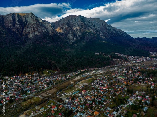 Aerial view of a town in a mountainous area © Adi Eu/Wirestock Creators