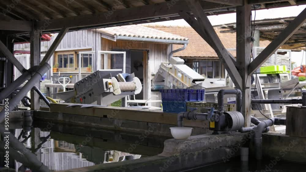 Cap-Ferret, France. Boats seen from an oyster village on the Bay of Arcachon Cap-Ferret, France. Boats seen from an oyster village on the Bay of Arcachon