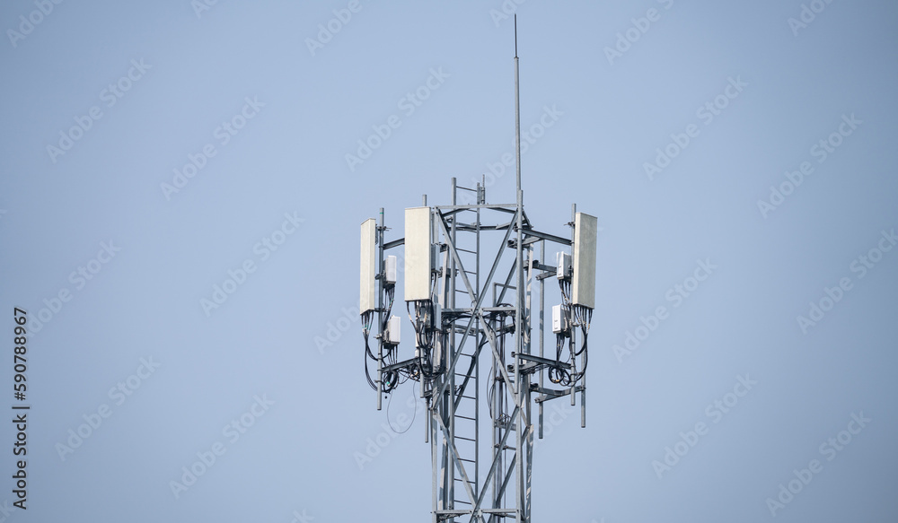 Telecommunication tower. Antenna on gray sky. Radio and satellite pole. Communication technology. Telecommunication industry. Mobile or telecom 5g network. Network connection business background.