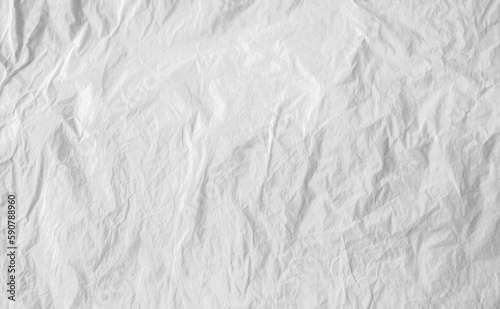 White crumpled paper texture background. White old creased and wrinkled paper abstract background. Grunge texture surface paper page material for vintage design. Manuscript letter paper. White sheet.