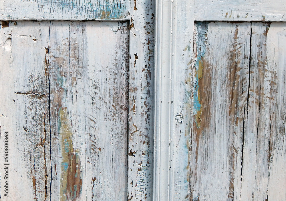 Close-up of antique white wooden cabinet with distressed paint texture and vintage hardware Close-up of antique white wooden cabinet with distressed paint texture and vintage hardware