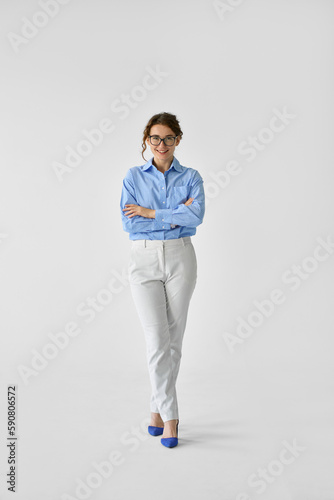 Happy young smiling confident professional business woman, happy stylish pretty lady executive looking at camera, standing isolated at white background, vertical full length portrait. photo