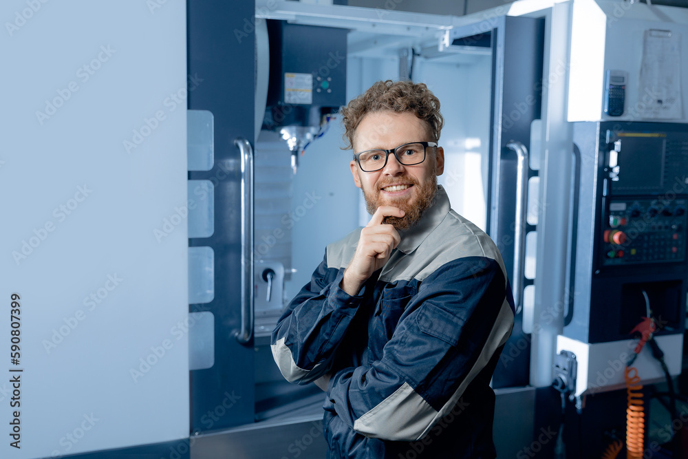 Engineer Worker caucasian man professional control CNC machinery on industry factory Engineer Worker caucasian man professional control CNC machinery on industry factory