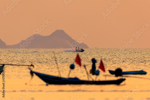 Fishing boat on sunset