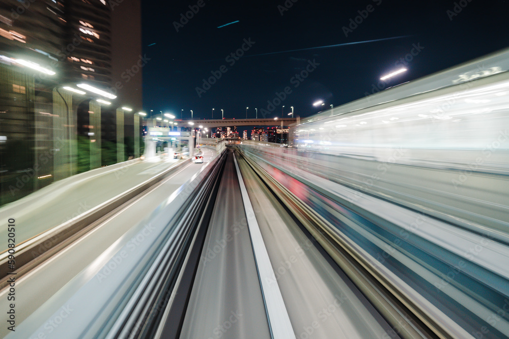 Motion blurred of train moving inside tunnel with daylight in tokyo, Japan.