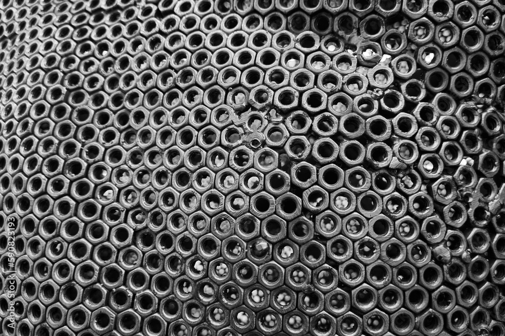 Waste metal texture. Gray background. nuts. Metal. Waste metal texture. Gray background. nuts. Metal.