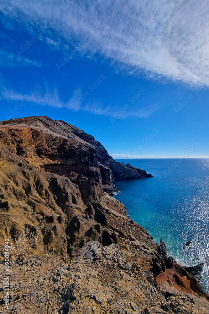 The picturesque coast of the island in the ocean. Rest on the sea.