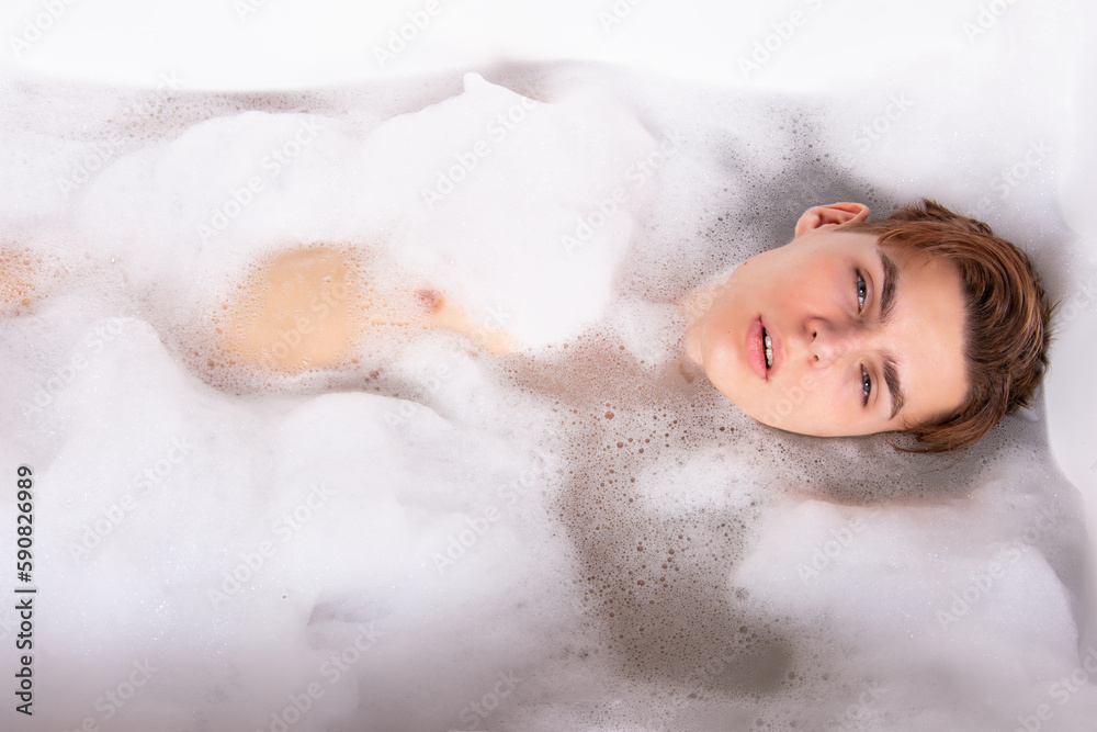 Relax and rest. Young attractive guy in the bath. Relax and rest. Young attractive guy in the bath.