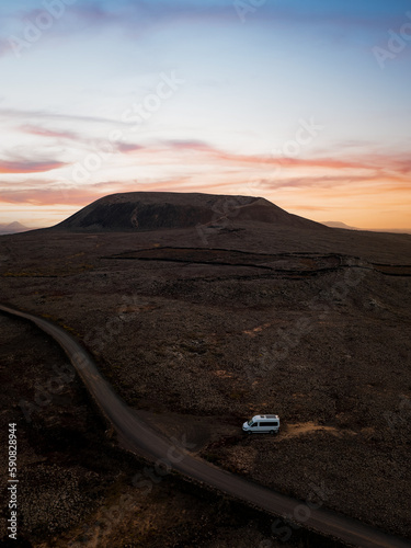 Obraz na płótnie View from above, stunning aerial view of a van parked under the Calderon Hondo in Fuerteventura, Canary Islands w salonie