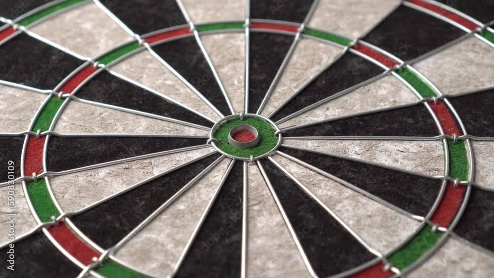 The dartboard slowly rotates. Close-up, angled view The dartboard slowly rotates. Close-up, angled view