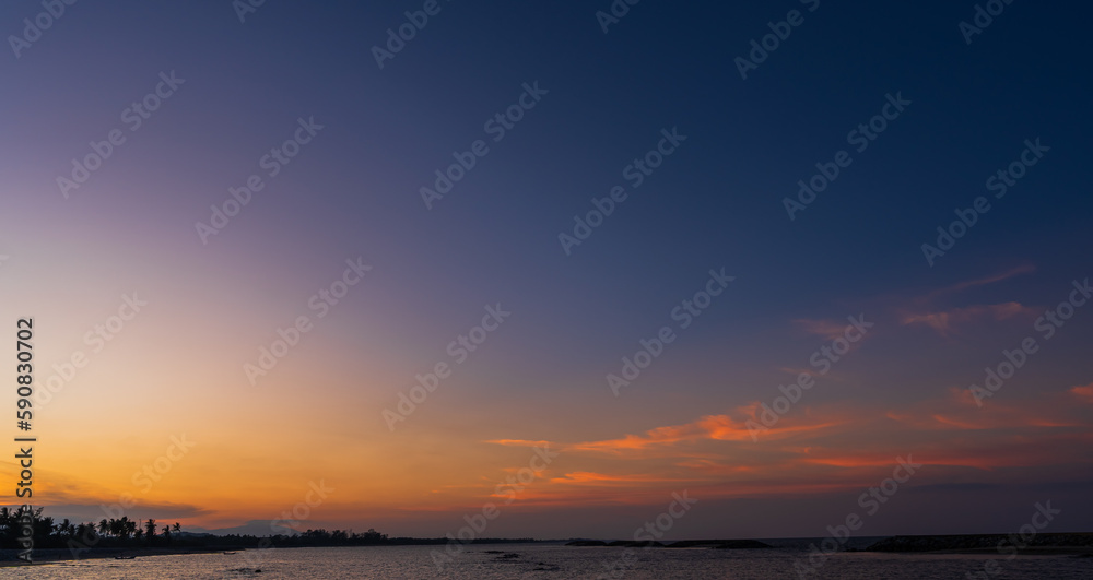 Dusk sky over sea in the evening on twilight landscape after sundown 