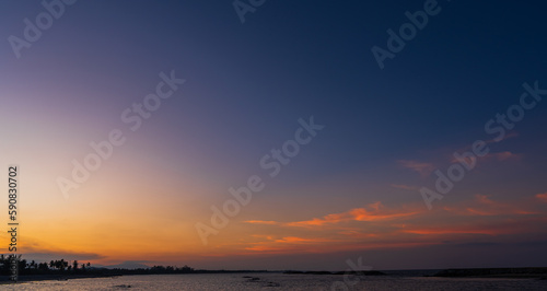 Dusk sky over sea in the evening on twilight landscape after sundown 