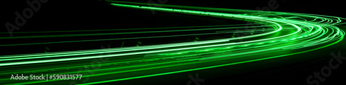 green car lights at night. long exposure