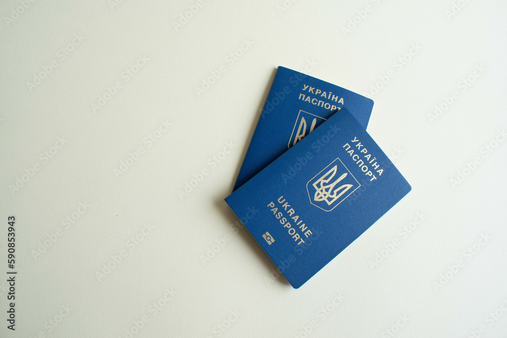 Ukrainian biometric passport id for travelling around Europe without visas on the table. Passport of Ukraine Ukrainian biometric passport id for travelling around Europe without visas on the table. Passport of Ukraine