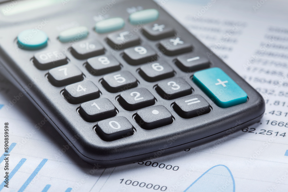 calculator and accounting document. Concept of banking, financial report and financial audit. calculator and accounting document. Concept of banking, financial report and financial audit.