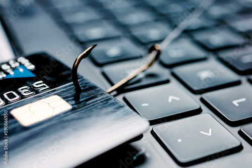 Fényképezés Credit card on the hook close-up. Phishing, data stealing