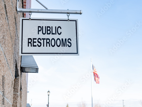 Sign with the American Flag indicating restrooms