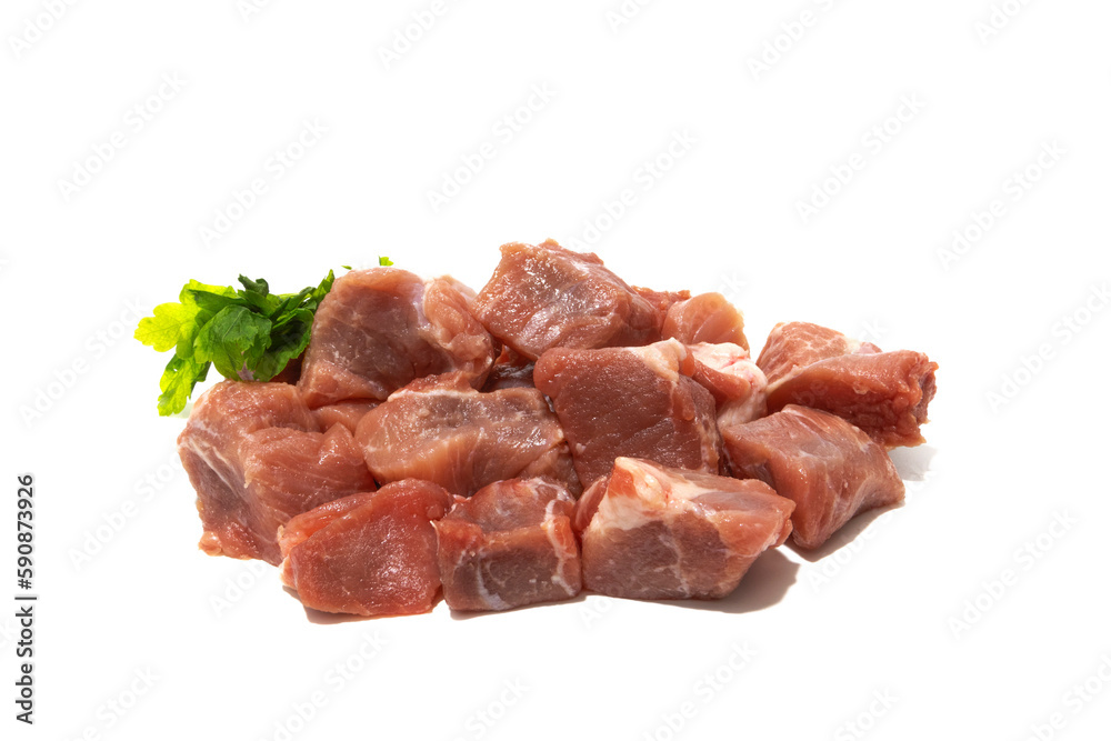 Pile of raw pork meat isolated on white background. Very used for stews.