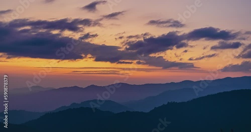 Sunrise timelapse in the morning at Doi Kad Phee, Chiang Rai, Thailand, December 2022 photo