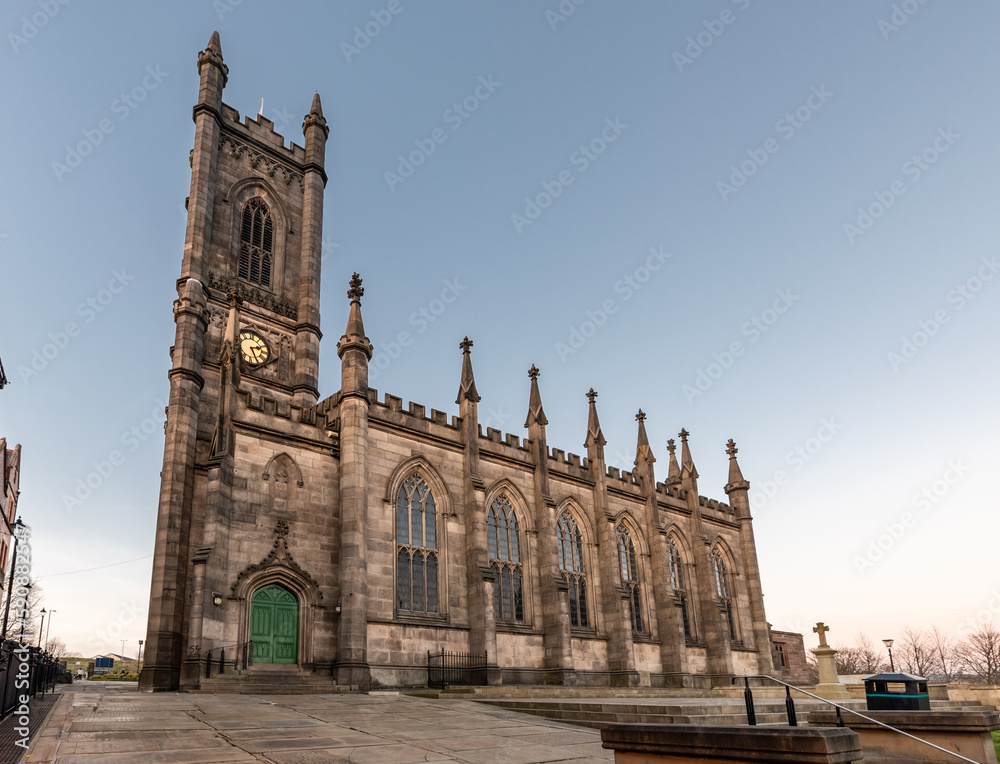 Façade view of Oldham Parish Church in UK