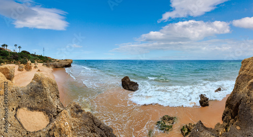 Rocks on summer sandy Albufeira beach  Algarve  Portugal . Panorama