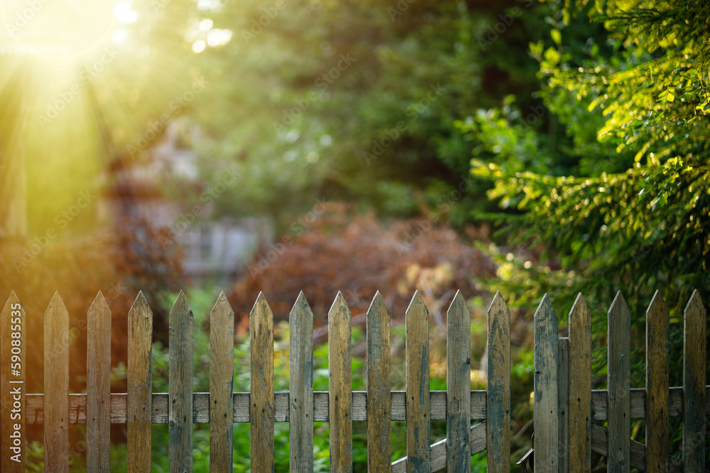 An old wooden fence in an abandoned village. Renovation of a country house.An abandoned house in the woods. An old wooden fence in an abandoned village. Renovation of a country house.An abandoned house in the woods.