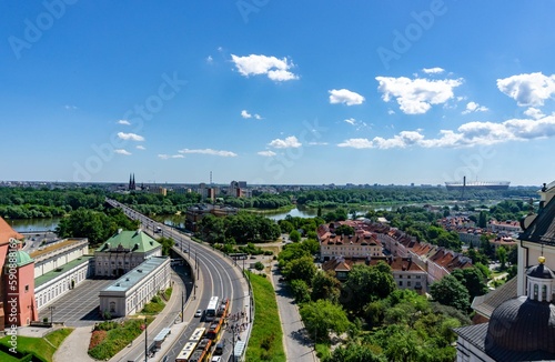 Part of the city of Warsaw seen from above, on a sunny day.
