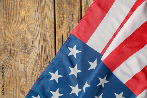 Fototapeta Naklejka Na Ścianę i Meble -  USA flag on wooden background. Memorial Day celebration