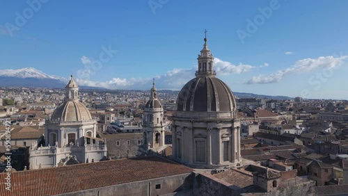 flying counter clockwise around dome of Cathedral of Saint Agatha in Catania Sicily photo