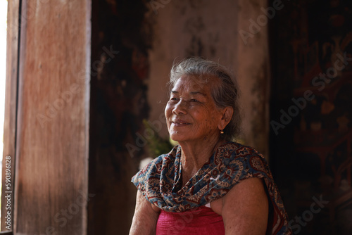 Portrait Smiling Asian elderly , Lifestyle of Retirement female senior at temple