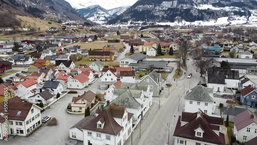 Aerial pedestal shot of Vikøyri, with cars driving by on the main road. photo
