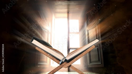 Quran Kareem muslim holy book in front of the window with heavenly light rays 