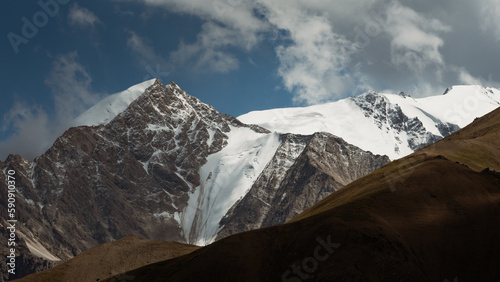 The massive mountain shield of the Turkestan Mountains. photo