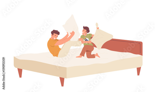 Overjoyed dad and little son child playing pillows in bed spending time together, happy fathers day
